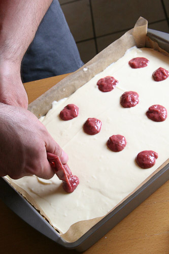 Piping the red strawberry dots