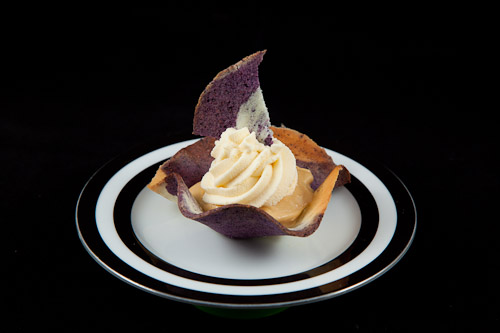 Star Anise infused Maple Mousse in a Blueberry and Lemon Tuile Cup topped with White Chocolate Whipped Cream