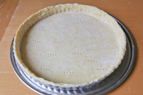 Crust fitted in tart pan