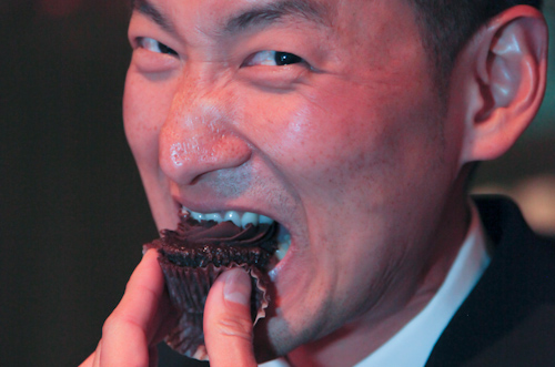 Ben Rhau eating a cupcake. jpg