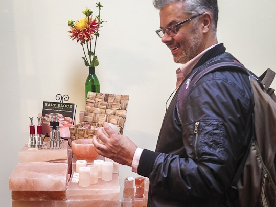 Joe Yonan checking out the Himalayan Salt candle holders at The Meadow. Photo by Irvin Lin of Eat the Love. www.eatthelove.com