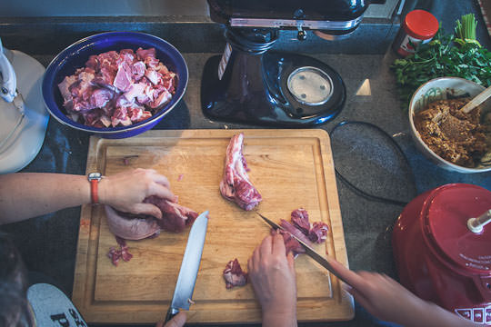 Meat chopping. Photo by Irvin Lin of Eat the Love. www.eatthelove.com