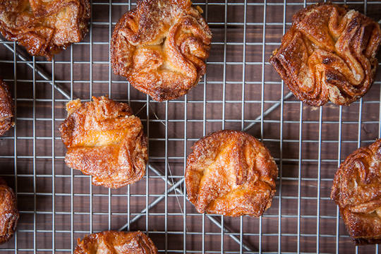 The Kouign Amann pastry, cooling on a rack. Photo and recipe by Irvin Lin of Eat the Love. www.eatthelove.com