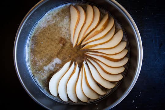 Lay the pear slices in the brown butter honey. Photo by Irvin Lin of Eat the Love. www.eatthelove.com