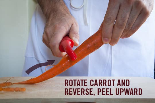 Rotate the carrot and peel upward using the other blade. Photo and technique by Irvin Lin of Eat the Love. www.eatthelove.com