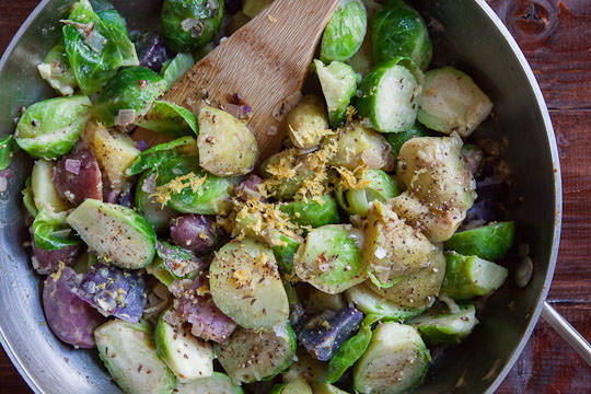 Brussels Sprout Salad with Fingerling Potatoes, seasoned with Caraway Seeds and Juniper Berries. Easy, made from scratch recipe from Irvin of Eat the Love. www.eatthelove.com