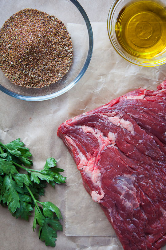 Skirt steak with rub and chimichurri sauce. Fast and easy dinner in 30 minutes or less. Recipe by Irvin Lin of Eat the Love.