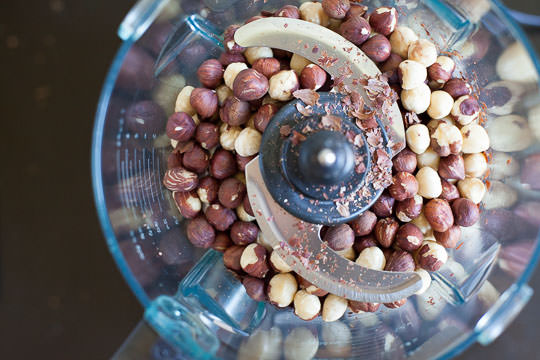 Place hazelnuts in the food processor for the Orange Hazelnut Cake. Photo by Irvin Lin of Eat the Love.