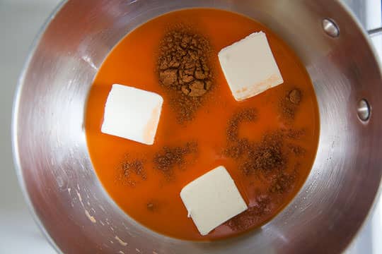 Cook the butter and spices in the carrot juice. Photo by Irvin Lin of Eat the Love.