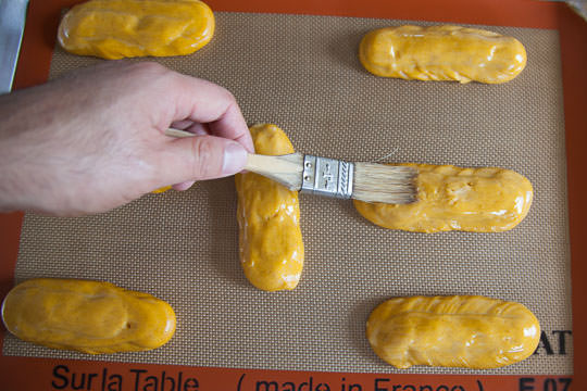 Brush the dough with the egg yolk wash. Photo by Irvin Lin of Eat the Love. 