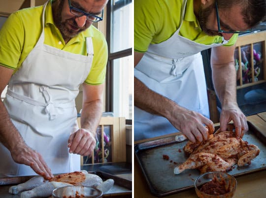 AJ is rubbing the Moroccan spices on the chicken. Photo by Irvin Lin of Eat the Love. 