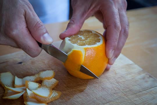 Cutting the zest off an orange. Photo by Irvin Lin of Eat the Love.