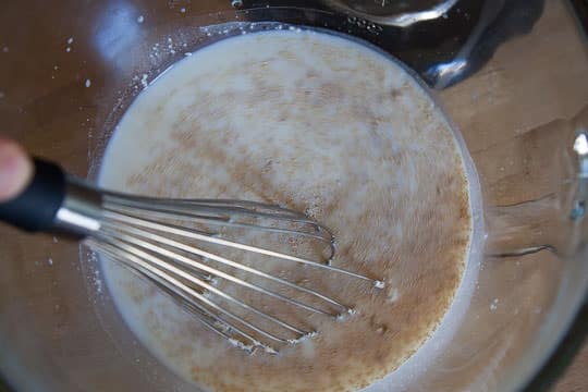 Whisk the yeast into the warm milk until dissolved. Photo by Irvin Lin of Eat the Love.