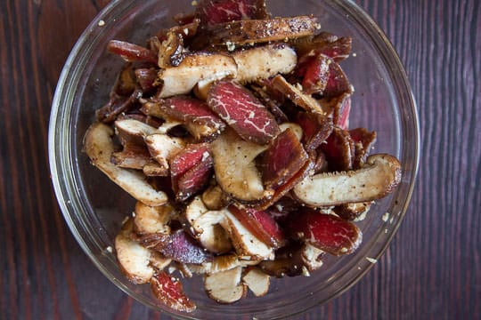 Mushroom and steak marinating for Korean Japchae. Photo by Irvin Lin of Eat the Love.