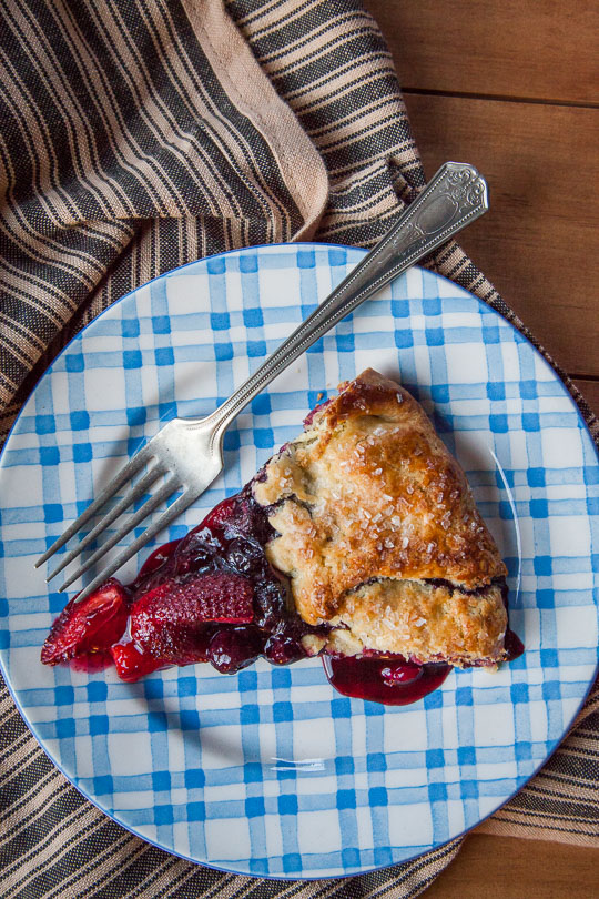 Berry galette with blueberries, strawberries and a crisp corn crust! Photo and recipe by Irvin Lin of Eat the Love.