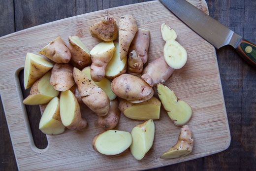 Cut the fingerling potatoes into 1-inch pieces. Process photo by Irvin Lin of Eat the Love.