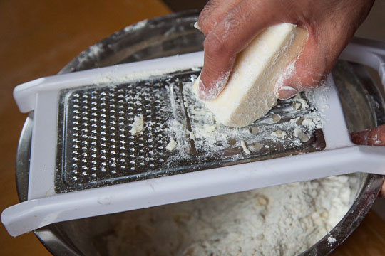 Grate the semi-frozen butter into the dry ingredients. Photo by Irvin Lin of Eat the Love.