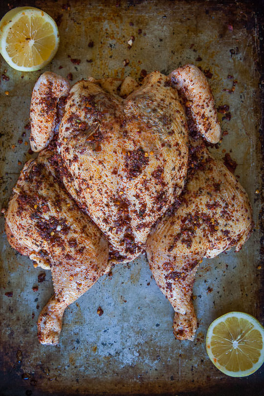 Rub the chicken all over with the paste and place on the roasting pan. Photo and recipe by Irvin Lin of Eat the Love.