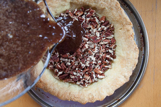 Pour the chocolate custard over the chopped pecans. Photo and recipe by Irvin Lin of Eat the Love.