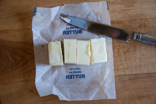 Cut the butter into quarters, or two tablespoons each. Photo and tip by Irvin Lin of Eat the Love.