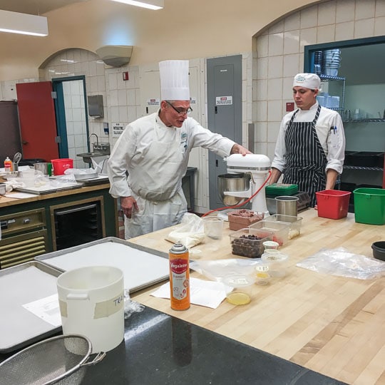 Chef and helper student at the Culinary Institute of American in Greystone. Photo by Irvin Lin of Eat the Love.