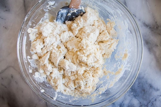 Stir to mix in, the batter will still be crumbly.