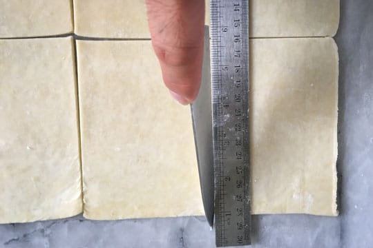 Cut the dough into 6 equal rectangles, 5 x 3 1/2 inches.