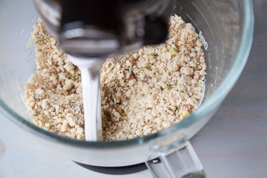 Increase speed when dough starts to look sandy.