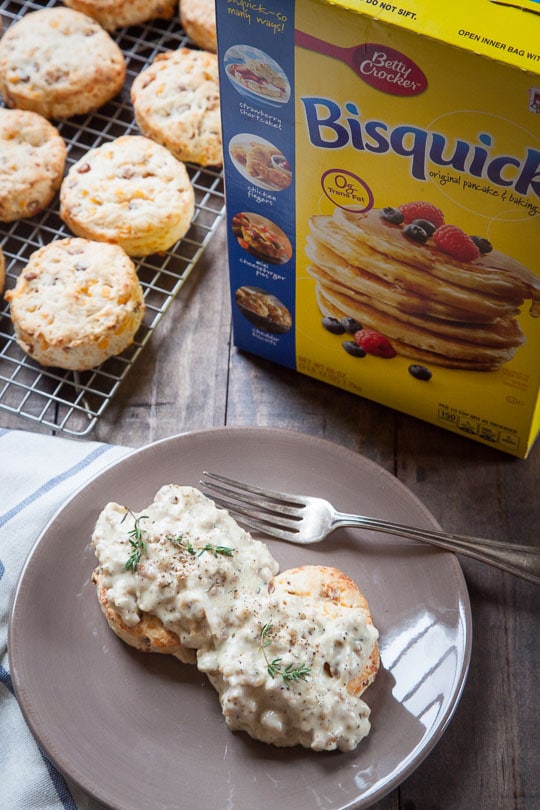 Bacon and cheddar biscuits with sausage and herb cream gravy. Recipe and photo by Irvin Lin of Eat the Love.