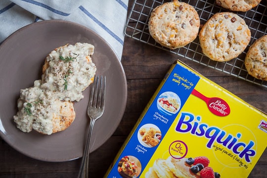 Bacon and cheddar biscuits with sausage and herb cream gravy. Recipe and photo by Irvin Lin of Eat the Love.