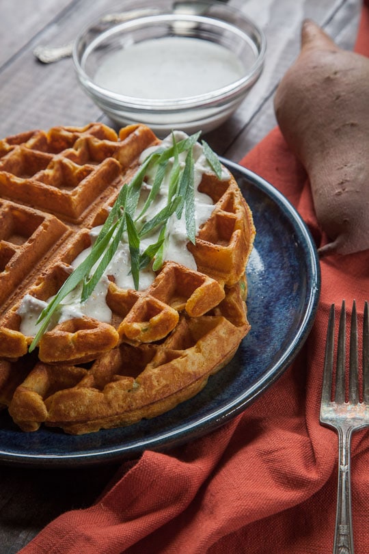 Savory Sweet Potato Waffles with Garlic Creme Fraiche. Recipe and photo by Irvin Lin of Eat the Love.