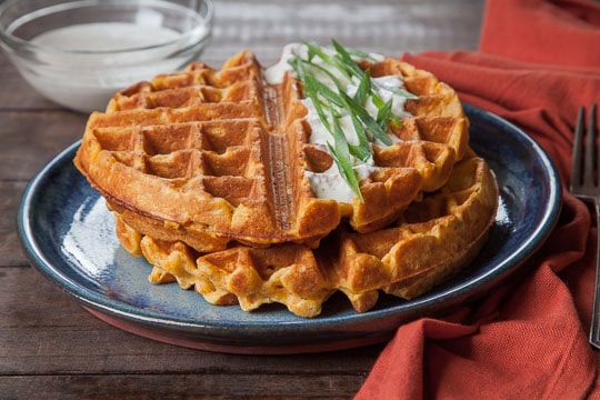 Savory Sweet Potato Waffles with Garlic Creme Fraiche. Recipe and photo by Irvin Lin of Eat the Love.