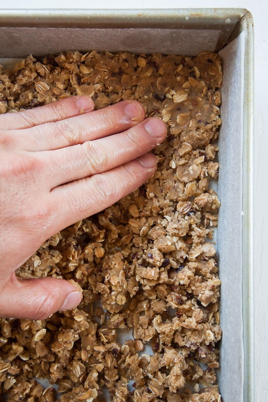 Press down on the crumb topping firmly to form a crust. 