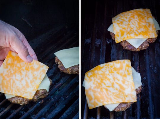 place two slices of cheese on the burgers.