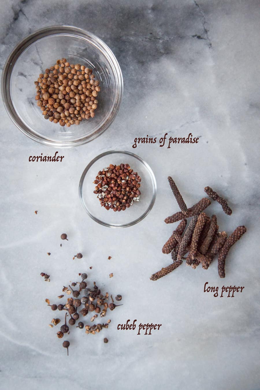 coriander, grains of paradise, long pepper, and cubeb pepper.