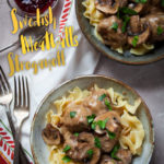 Swedish Meatball Stroganoff served in two bowls with side bowl of lingonberry sauce.