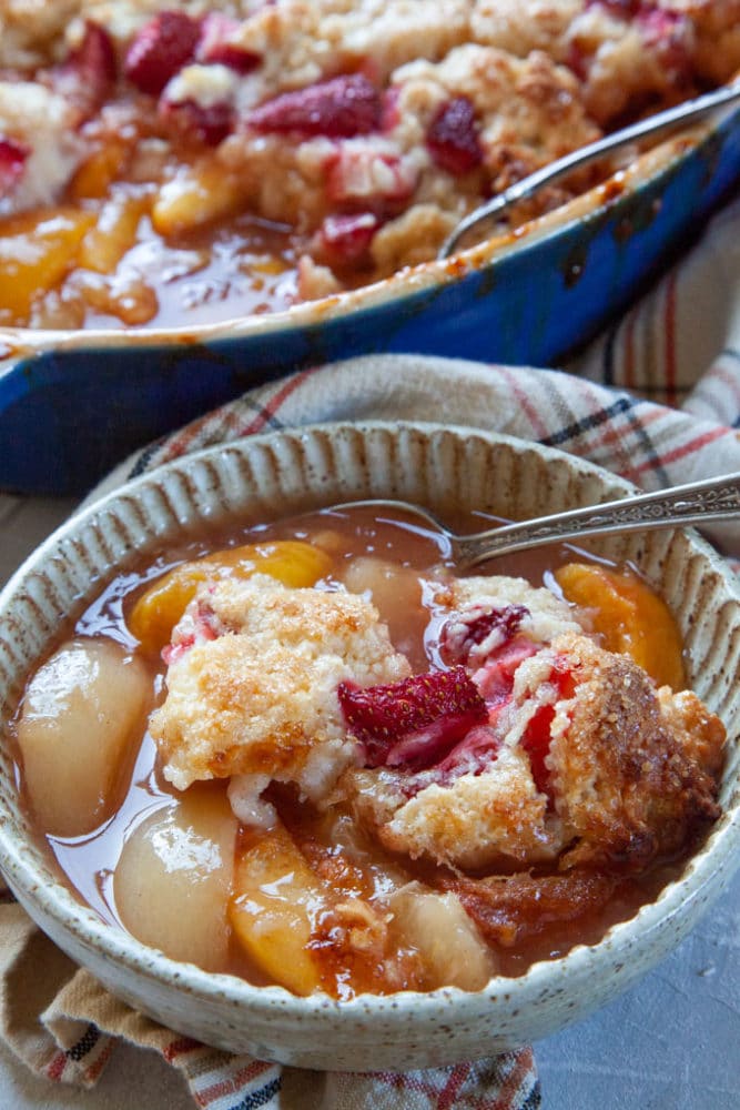 Peach Champagne Cobbler with Strawberry Biscuits