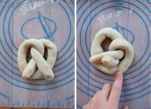 Flip the top down to form the pretzel, then lift up one side and dab some water underneath the tip to "glue" the tip down.