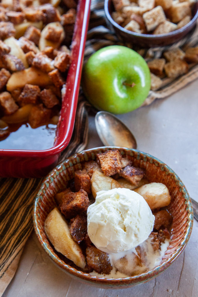 Simple Apple Brown Betty Recipe made with IPA beer, served with a scoop of vanilla bean ice cream.