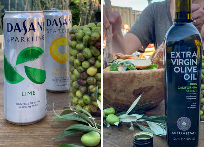 Cans of Dasani Sparkling Water and a bottle of Cobram Estate Extra Virgin California Select Olive Oil.