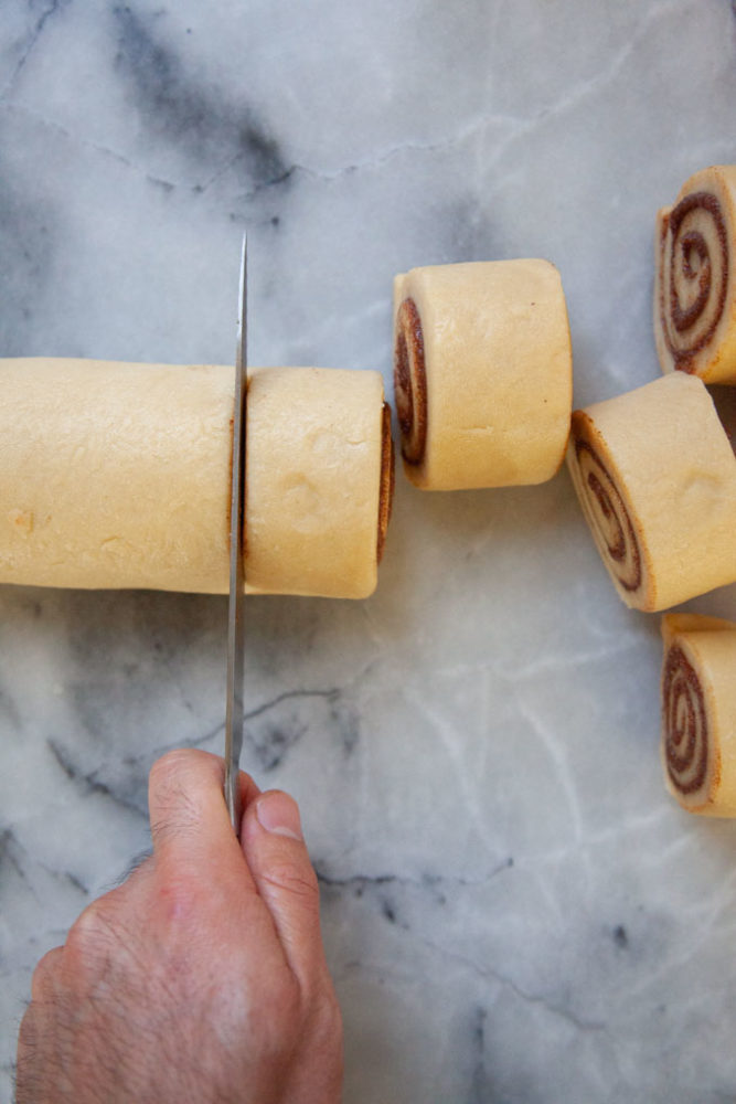Cut the cinnamon rolls into 1 1/2-inch thick discs.