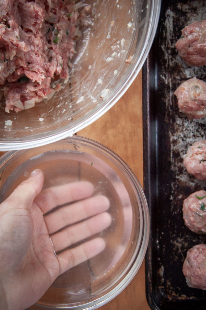 dampen your hands to help form the Irish lamb meatballs.