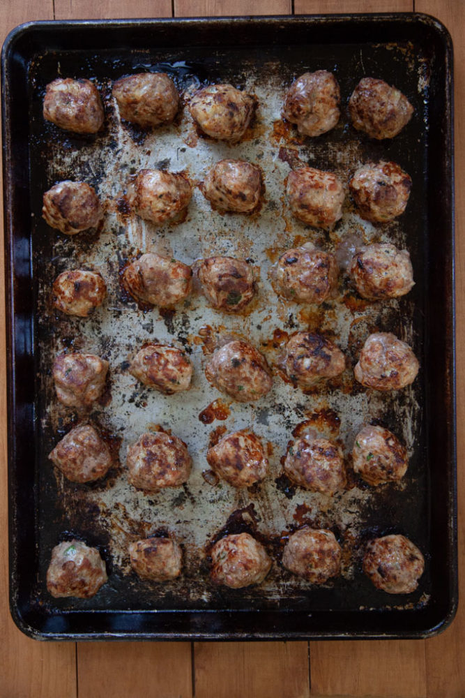 Bake the meatballs on a rimmed baking sheet to make sure they are fully cooked.