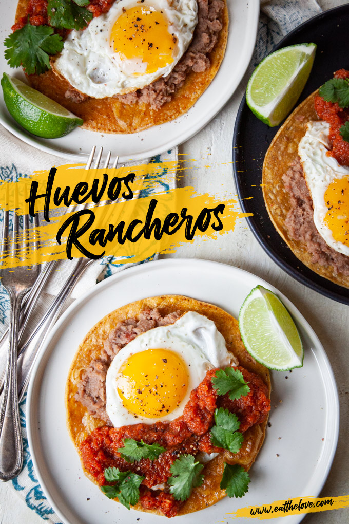 Huevos Rancheros (rancher egg tacos) on plates.