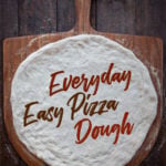 Easy pizza dough that is ready in a little over an hour on a pizza peel.