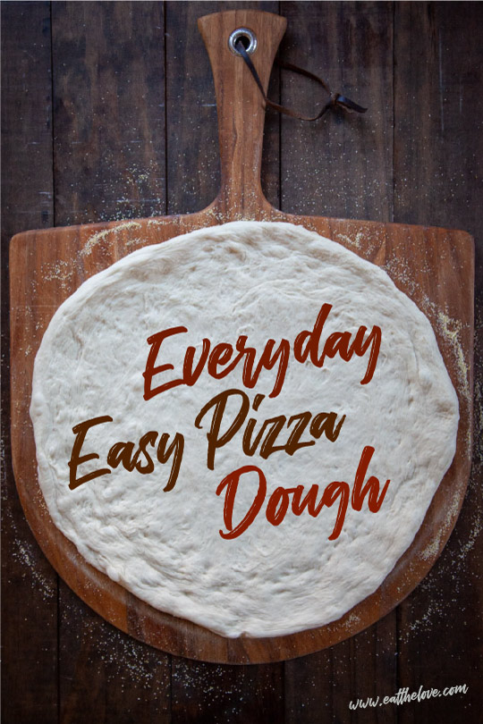 Easy pizza dough that is ready in a little over an hour on a pizza peel.
