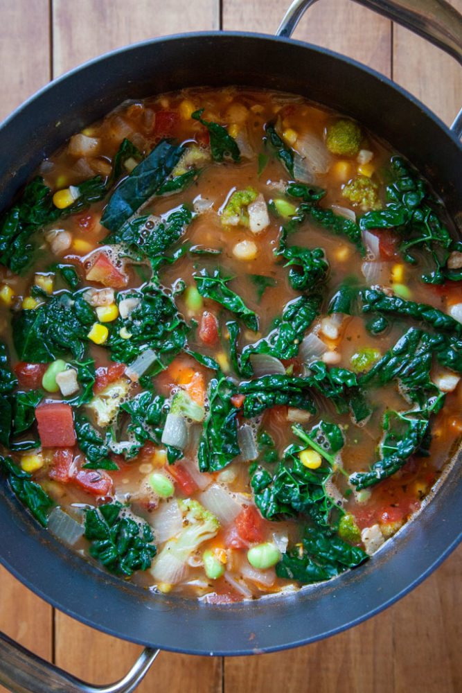 A large pot of minestrone soup.