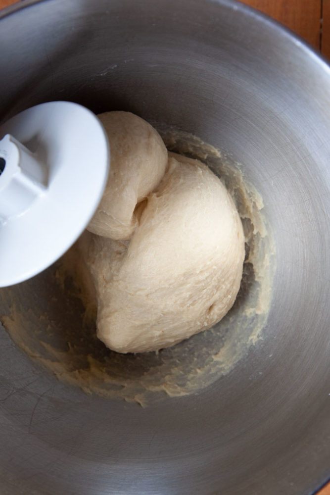 Kneading the dough with a stand mixer.