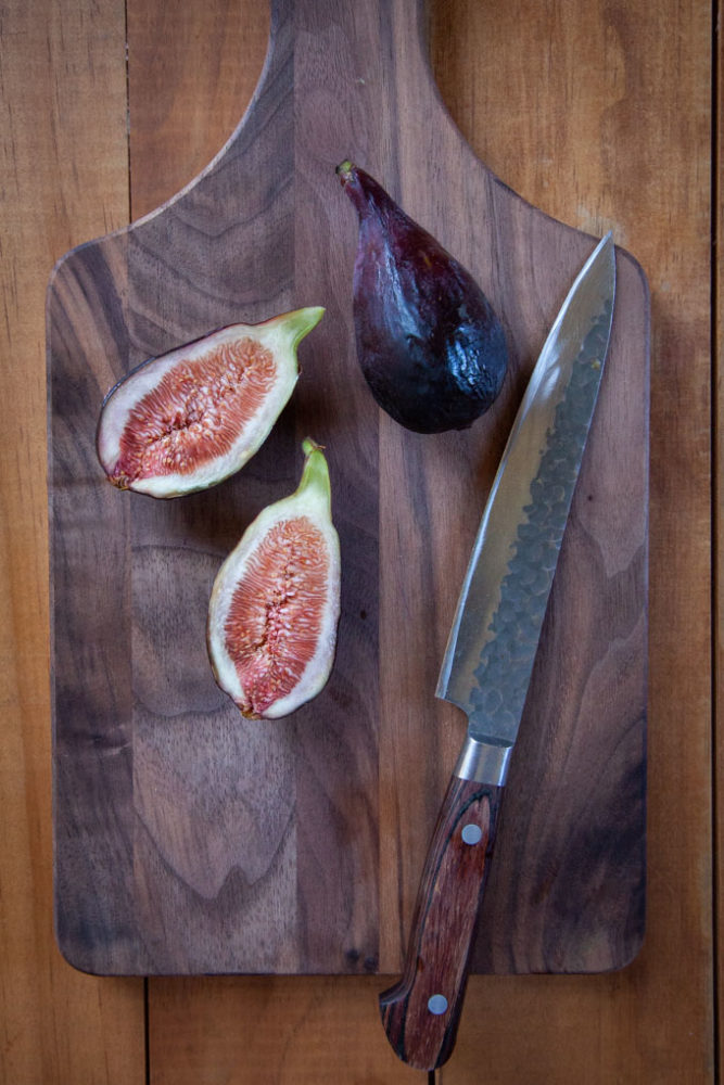 fig cut on a cutting board.