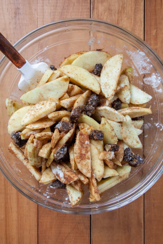 All the apple and prune filling ingredients combined in a bowl